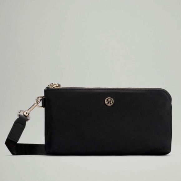 lululemon athletica Handbags - NWT Lululemon Slim Curved Wristlet
BLK/GOLD ONE SIZE Wallet